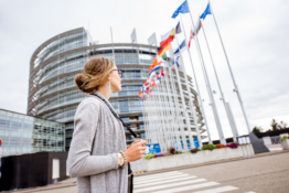 woman-near-the-european-parliament-building-in-str-2023-11-27-05-32-06-utc